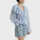 Martha – Hellblaue Rüschenbluse mit Streifen