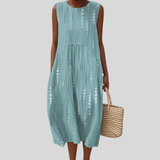 Vestido de linho verde menta com padrão perfurado