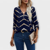 Emma – Dunkelblaue Bluse mit goldfarbenem Zickzackmuster