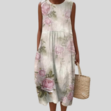 Cremefarbenes Kleid mit Rosenmotiv