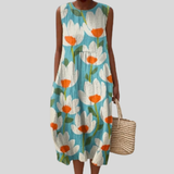 Türkises Kleid mit weißen Blüten