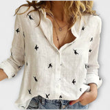 Nadia - Hellblaue Bluse mit Schwalbenmuster