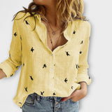 Nadia - Hellblaue Bluse mit Schwalbenmuster