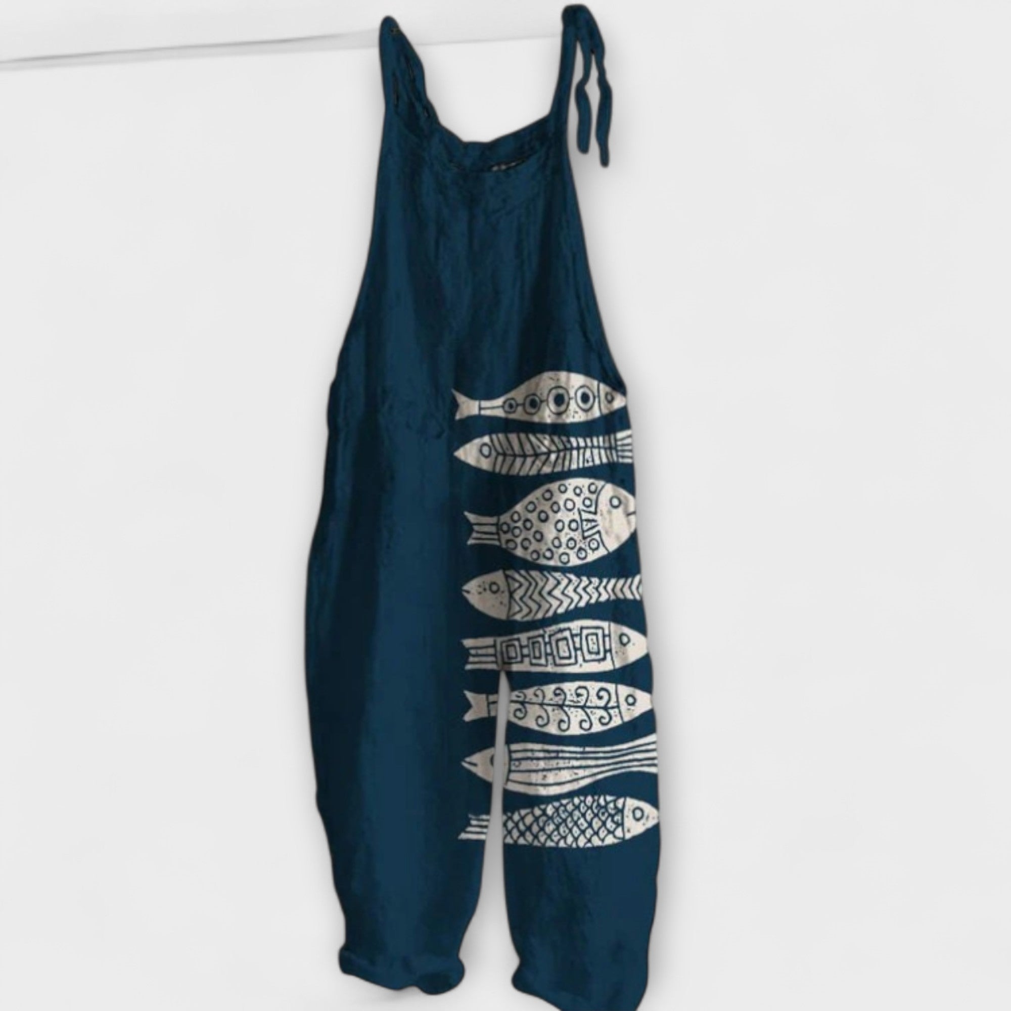Audrey - Schwarze Latzhose mit goldenem Fischmotiv