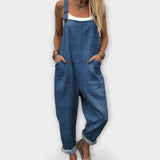 Petra - Blaue Latzhose mit Blütenmuster