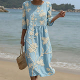 Cátia - Hellblaues Midi-Kleid mit Blütenstickerei