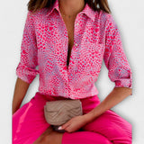 Blaue Bluse mit grafischem Muster und Kragen